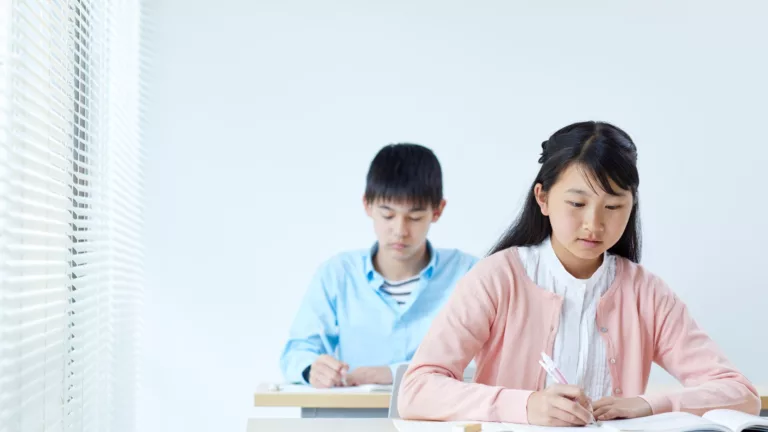 Enrichment Classes Singapore - Soft Skills for Kids - SuperMinds - Kids Studying Hard for Exams